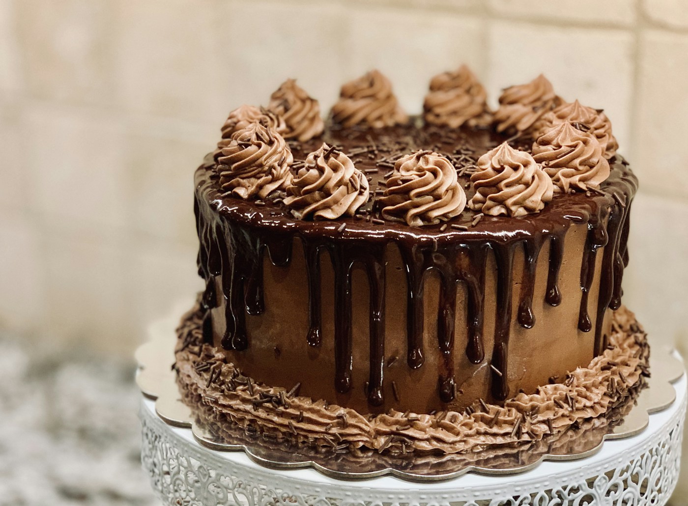 Chocolate layer cake on a cake stand